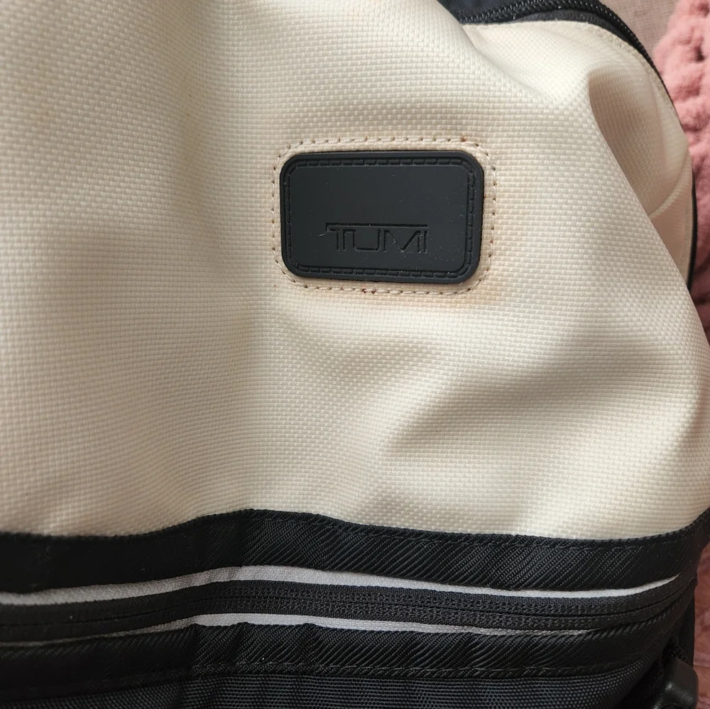 Tumi Black and Cream Backpack